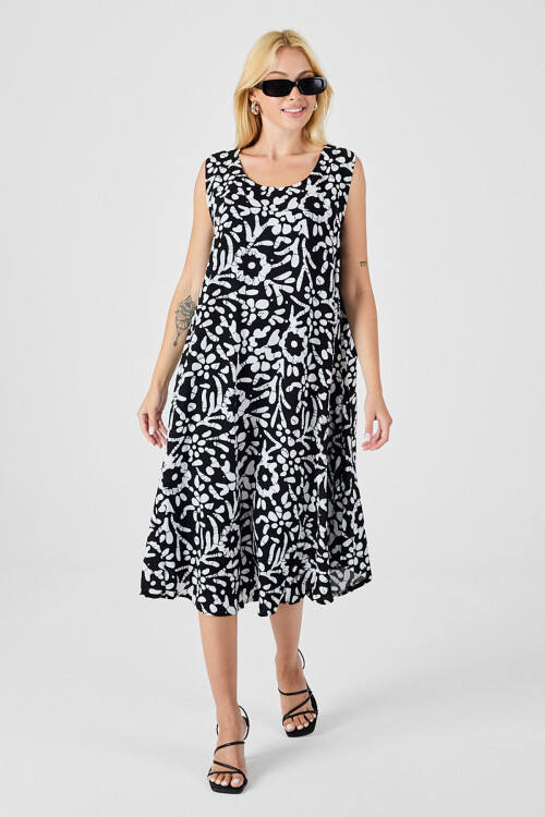 Siyah-Beyaz U Yaka Kolsuz Eteği Asimetrik Kesim Desenli Midi Boy Elbise BCVL-254016