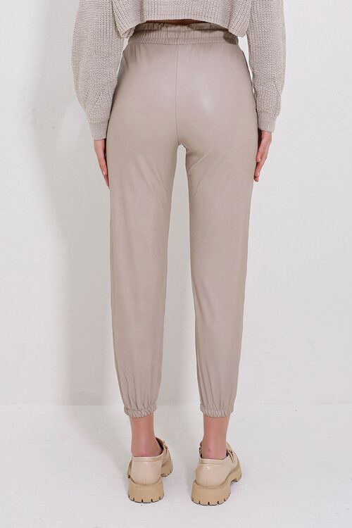 Bej Çift Cepli Bel Ve Bilek Lastikli İçi Şardonlu Casual Suni Deri Pantolon BCHYL-251226