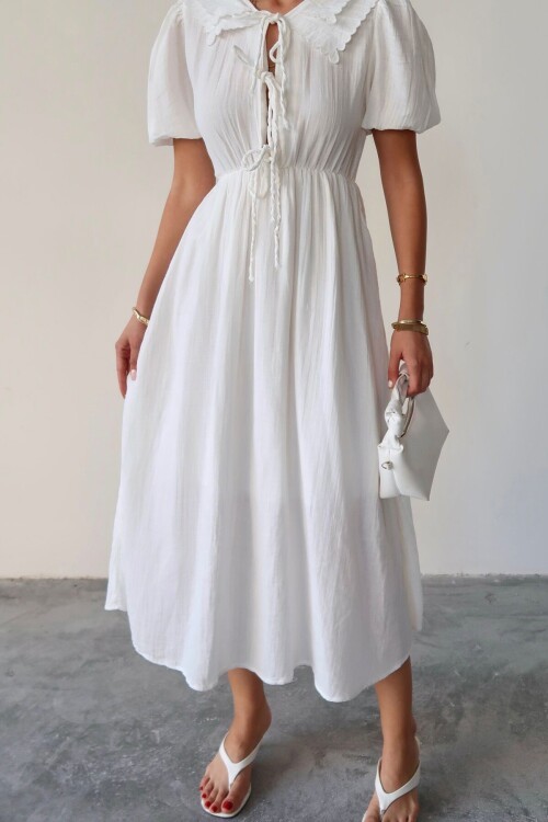 Beyaz Bebe Yaka Bağlamalı Astarlı Uzun Müslin Elbise BCRU-261301