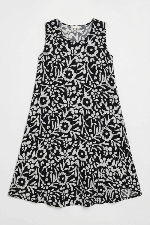 Siyah-Beyaz U Yaka Kolsuz Eteği Asimetrik Kesim Desenli Midi Boy Elbise